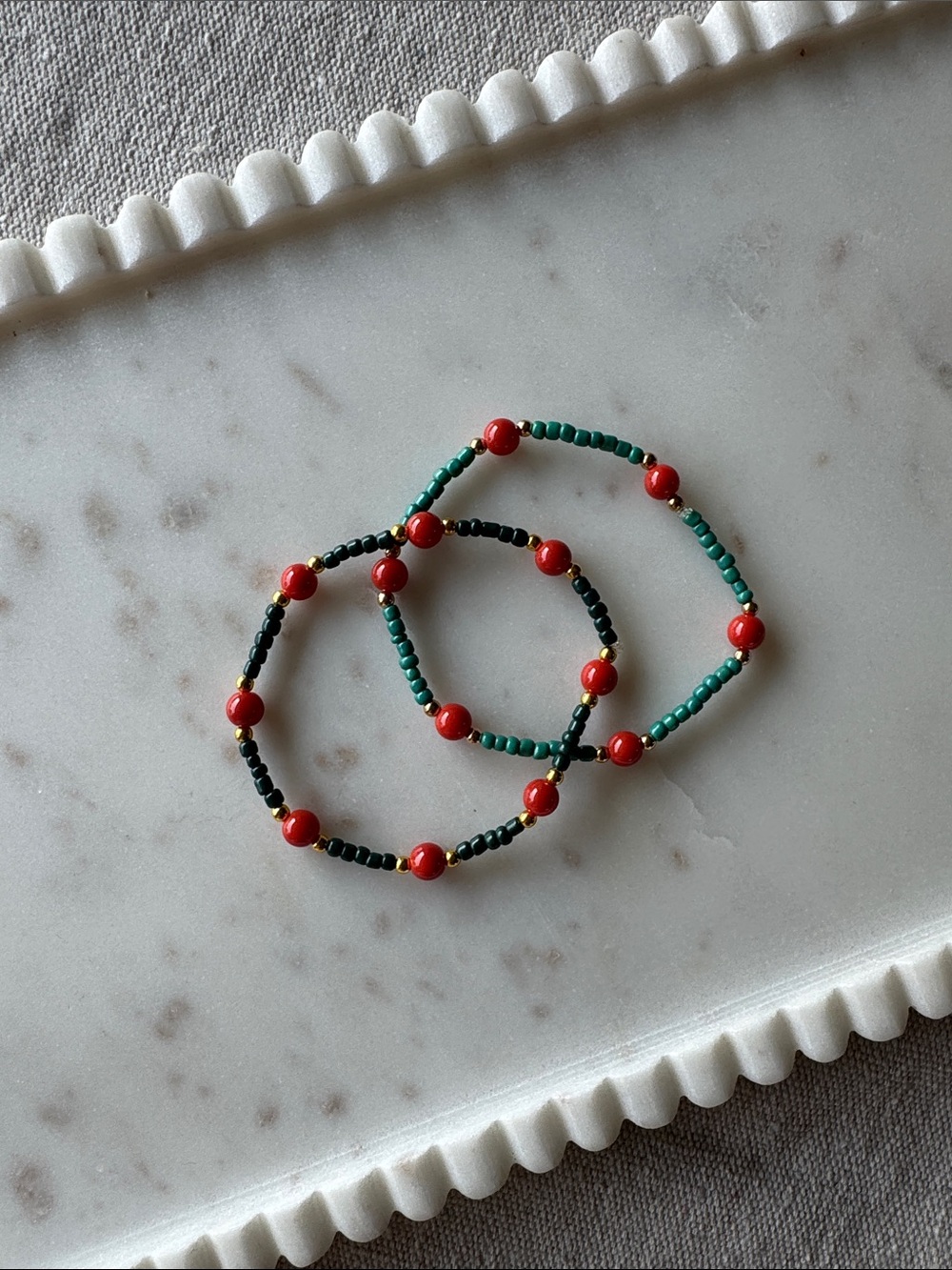 Se of 2 Beaded Stretch Bracelets orange and green